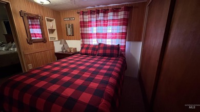 Completely renovated mobile home with cedar siding at Terrace on Terrace Lakes Golf Resort in Idaho - for sale on GolfHomes.com, golf home, golf lot