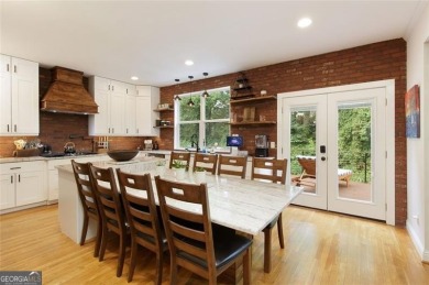 This custom-built home sits on a roundabout cul-de-sac nestled on Hampton Golf Village in Georgia - for sale on GolfHomes.com, golf home, golf lot