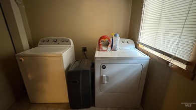 Completely renovated mobile home with cedar siding at Terrace on Terrace Lakes Golf Resort in Idaho - for sale on GolfHomes.com, golf home, golf lot