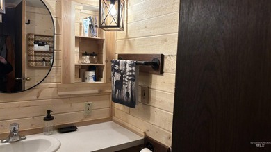 Completely renovated mobile home with cedar siding at Terrace on Terrace Lakes Golf Resort in Idaho - for sale on GolfHomes.com, golf home, golf lot