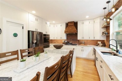 This custom-built home sits on a roundabout cul-de-sac nestled on Hampton Golf Village in Georgia - for sale on GolfHomes.com, golf home, golf lot