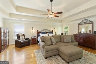 This custom-built home sits on a roundabout cul-de-sac nestled on Hampton Golf Village in Georgia - for sale on GolfHomes.com, golf home, golf lot