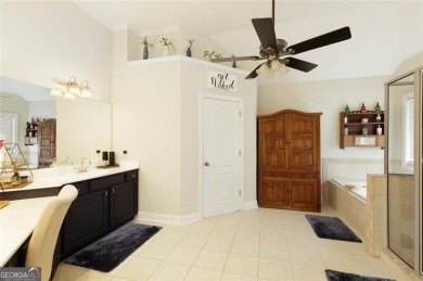 This custom-built home sits on a roundabout cul-de-sac nestled on Hampton Golf Village in Georgia - for sale on GolfHomes.com, golf home, golf lot