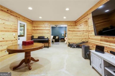 This custom-built home sits on a roundabout cul-de-sac nestled on Hampton Golf Village in Georgia - for sale on GolfHomes.com, golf home, golf lot