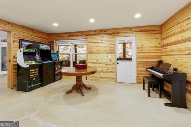 This custom-built home sits on a roundabout cul-de-sac nestled on Hampton Golf Village in Georgia - for sale on GolfHomes.com, golf home, golf lot