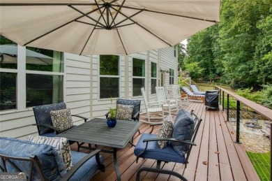 This custom-built home sits on a roundabout cul-de-sac nestled on Hampton Golf Village in Georgia - for sale on GolfHomes.com, golf home, golf lot