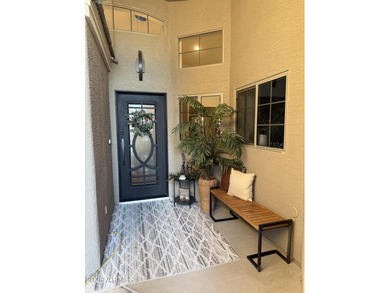 This beautiful home blends modern upgrades with resort-style on Tuscany Falls At Pebble Creek in Arizona - for sale on GolfHomes.com, golf home, golf lot