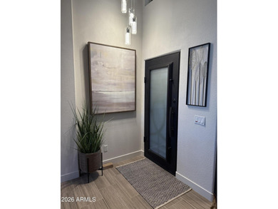 This beautiful home blends modern upgrades with resort-style on Tuscany Falls At Pebble Creek in Arizona - for sale on GolfHomes.com, golf home, golf lot