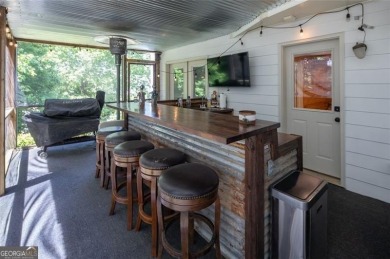 This custom-built home sits on a roundabout cul-de-sac nestled on Hampton Golf Village in Georgia - for sale on GolfHomes.com, golf home, golf lot