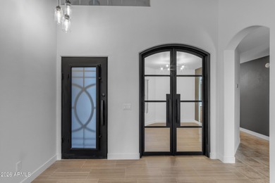 This beautiful home blends modern upgrades with resort-style on Tuscany Falls At Pebble Creek in Arizona - for sale on GolfHomes.com, golf home, golf lot