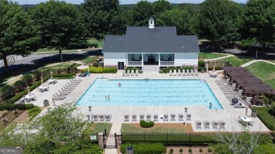 This custom-built home sits on a roundabout cul-de-sac nestled on Hampton Golf Village in Georgia - for sale on GolfHomes.com, golf home, golf lot