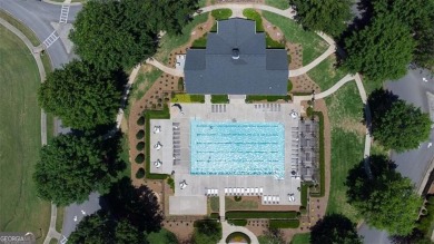 This custom-built home sits on a roundabout cul-de-sac nestled on Hampton Golf Village in Georgia - for sale on GolfHomes.com, golf home, golf lot