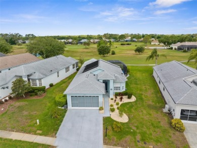 FANTASTIC MOVE IN READY POOL HOME with AWESOME REAR VIEW of HOLE on Heritage Pines Country Club in Florida - for sale on GolfHomes.com, golf home, golf lot