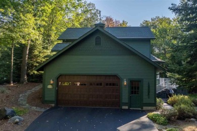 Nestled within the prestigious Charlevoix Country Club, this on Charlevoix Golf and Country Club in Michigan - for sale on GolfHomes.com, golf home, golf lot