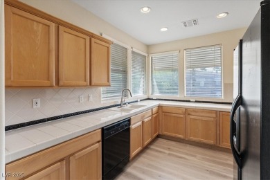 Discover luxury living in this beautifully updated two-story on TPC at Summerlin in Nevada - for sale on GolfHomes.com, golf home, golf lot