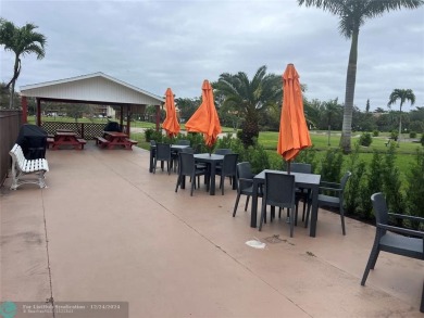 One bedroom, one bathroom condo in Lauderhill East, totally on Lauderhill Golf Course in Florida - for sale on GolfHomes.com, golf home, golf lot