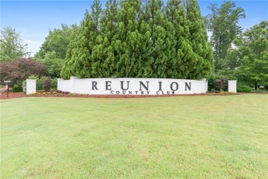 It looks like something out of a storybook--crisp trim on Reunion Golf Club in Georgia - for sale on GolfHomes.com, golf home, golf lot