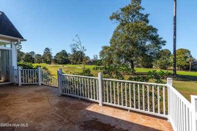 This exquisite custom home is situated on the Azalea 3 Fairway on Brunswick Plantation and Golf Resorts in North Carolina - for sale on GolfHomes.com, golf home, golf lot