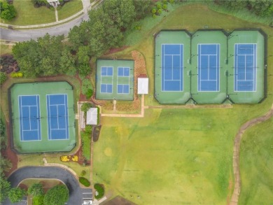 It looks like something out of a storybook--crisp trim on Reunion Golf Club in Georgia - for sale on GolfHomes.com, golf home, golf lot