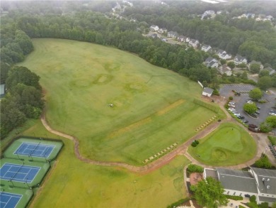It looks like something out of a storybook--crisp trim on Reunion Golf Club in Georgia - for sale on GolfHomes.com, golf home, golf lot