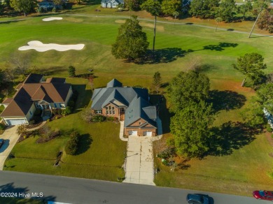 This exquisite custom home is situated on the Azalea 3 Fairway on Brunswick Plantation and Golf Resorts in North Carolina - for sale on GolfHomes.com, golf home, golf lot