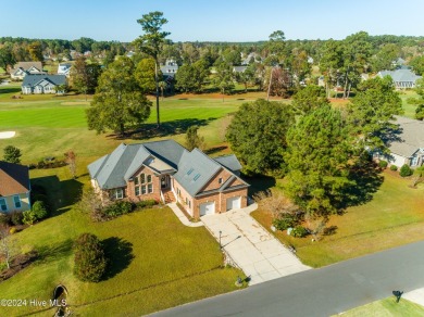 This exquisite custom home is situated on the Azalea 3 Fairway on Brunswick Plantation and Golf Resorts in North Carolina - for sale on GolfHomes.com, golf home, golf lot