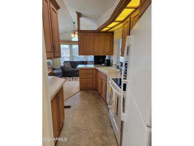 REDUCED!! This is a lovely furnished park model with one of the on 3 Parks Fairways in Arizona - for sale on GolfHomes.com, golf home, golf lot