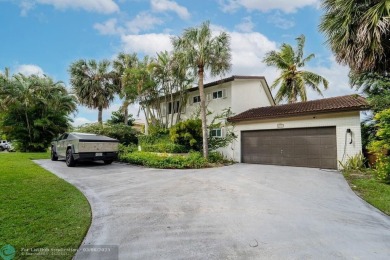 Impeccably remodeled, this 5-bedroom, 4.5-bathroom home, in the on Deer Creek Golf Club in Florida - for sale on GolfHomes.com, golf home, golf lot