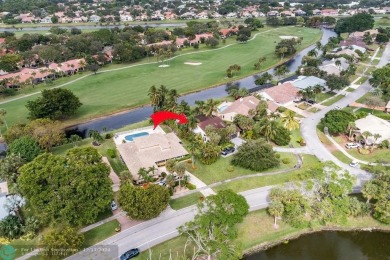 Impeccably remodeled, this 5-bedroom, 4.5-bathroom home, in the on Deer Creek Golf Club in Florida - for sale on GolfHomes.com, golf home, golf lot