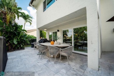 Impeccably remodeled, this 5-bedroom, 4.5-bathroom home, in the on Deer Creek Golf Club in Florida - for sale on GolfHomes.com, golf home, golf lot