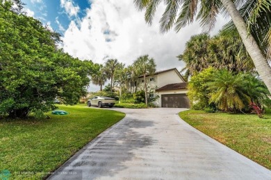 Impeccably remodeled, this 5-bedroom, 4.5-bathroom home, in the on Deer Creek Golf Club in Florida - for sale on GolfHomes.com, golf home, golf lot