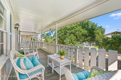 Charming Beach Cottage on Canal Lot with Boat Dock This is a on Sea Trail Golf Resort in North Carolina - for sale on GolfHomes.com, golf home, golf lot