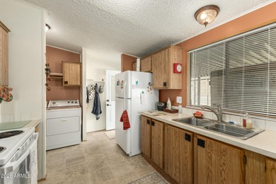 This beautifully maintained, fully furnished home features a on 3 Parks Fairways in Arizona - for sale on GolfHomes.com, golf home, golf lot