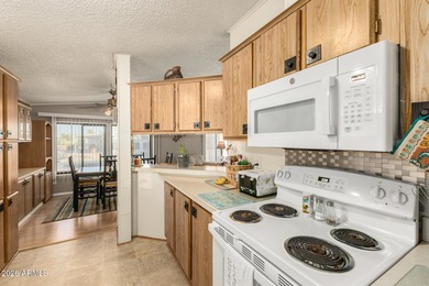 This beautifully maintained, fully furnished home features a on 3 Parks Fairways in Arizona - for sale on GolfHomes.com, golf home, golf lot