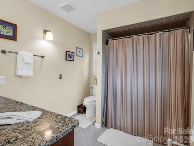 Ground-level condo offering a peaceful golf course view. The on Hendersonville Country Club in North Carolina - for sale on GolfHomes.com, golf home, golf lot