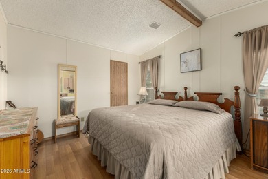 This beautifully maintained, fully furnished home features a on 3 Parks Fairways in Arizona - for sale on GolfHomes.com, golf home, golf lot