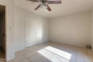 NIce location, all tile floors, no popcorn ceilings. front on Country Club of Green Valley in Arizona - for sale on GolfHomes.com, golf home, golf lot