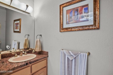 Welcome to your private retreat in a desirable gated community on London Bridge Golf Course in Arizona - for sale on GolfHomes.com, golf home, golf lot