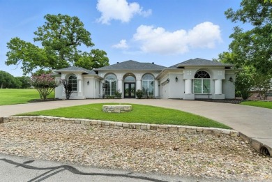 Tucked inside the gates of the prestigious Pecan Plantation golf on Pecan Plantation Country Club in Texas - for sale on GolfHomes.com, golf home, golf lot