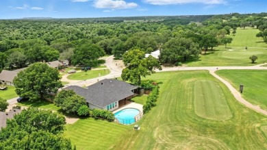 Tucked inside the gates of the prestigious Pecan Plantation golf on Pecan Plantation Country Club in Texas - for sale on GolfHomes.com, golf home, golf lot