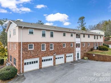Ground-level condo offering a peaceful golf course view. The on Hendersonville Country Club in North Carolina - for sale on GolfHomes.com, golf home, golf lot