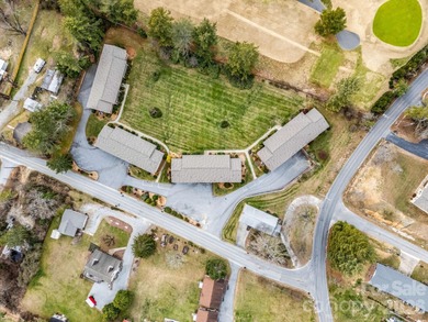 Ground-level condo offering a peaceful golf course view. The on Hendersonville Country Club in North Carolina - for sale on GolfHomes.com, golf home, golf lot