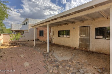 NIce location, all tile floors, no popcorn ceilings. front on Country Club of Green Valley in Arizona - for sale on GolfHomes.com, golf home, golf lot