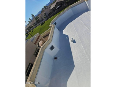 Welcome to your private retreat in a desirable gated community on London Bridge Golf Course in Arizona - for sale on GolfHomes.com, golf home, golf lot