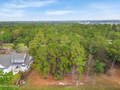 Located in the River's Edge community, Lot 83 offers an on Rivers Edge Golf Club in North Carolina - for sale on GolfHomes.com, golf home, golf lot