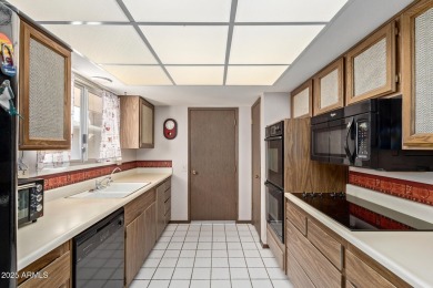 The epitome of comfort nestled within a serene 55+ adult on Stardust Golf Course in Arizona - for sale on GolfHomes.com, golf home, golf lot