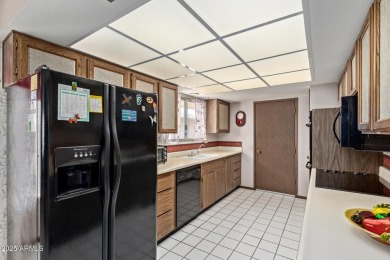 The epitome of comfort nestled within a serene 55+ adult on Stardust Golf Course in Arizona - for sale on GolfHomes.com, golf home, golf lot