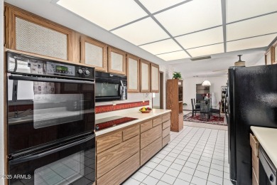 The epitome of comfort nestled within a serene 55+ adult on Stardust Golf Course in Arizona - for sale on GolfHomes.com, golf home, golf lot