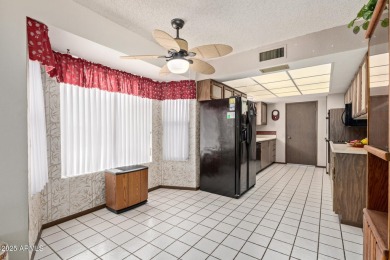 The epitome of comfort nestled within a serene 55+ adult on Stardust Golf Course in Arizona - for sale on GolfHomes.com, golf home, golf lot
