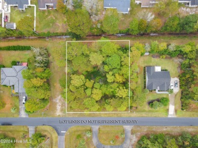 Beautiful approximately .68 acre property nestled in the acreage on Carolina Shores Golf Course in North Carolina - for sale on GolfHomes.com, golf home, golf lot